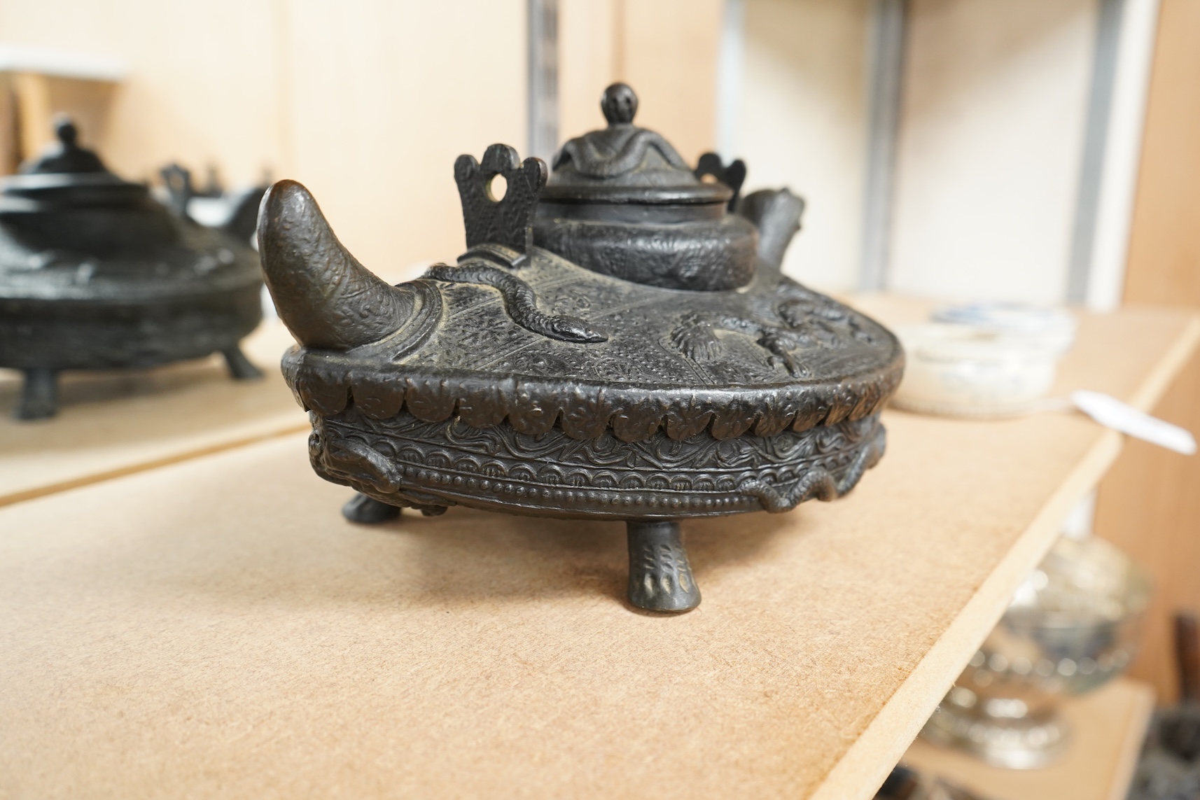 A Chinese cast bronze 'tortoise’ ritual tea kettle, 30cm long